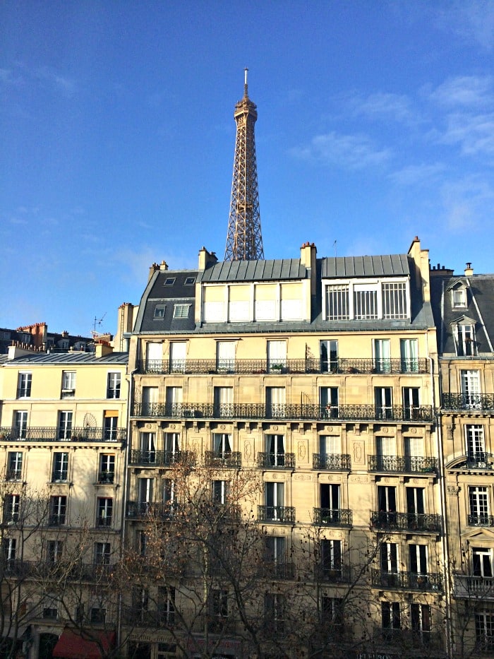 Eiffel Tower above the rooftops